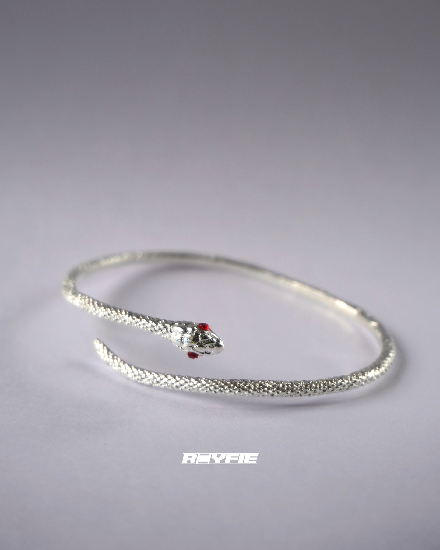 INTERSEKT Sleek Serpent Bangle