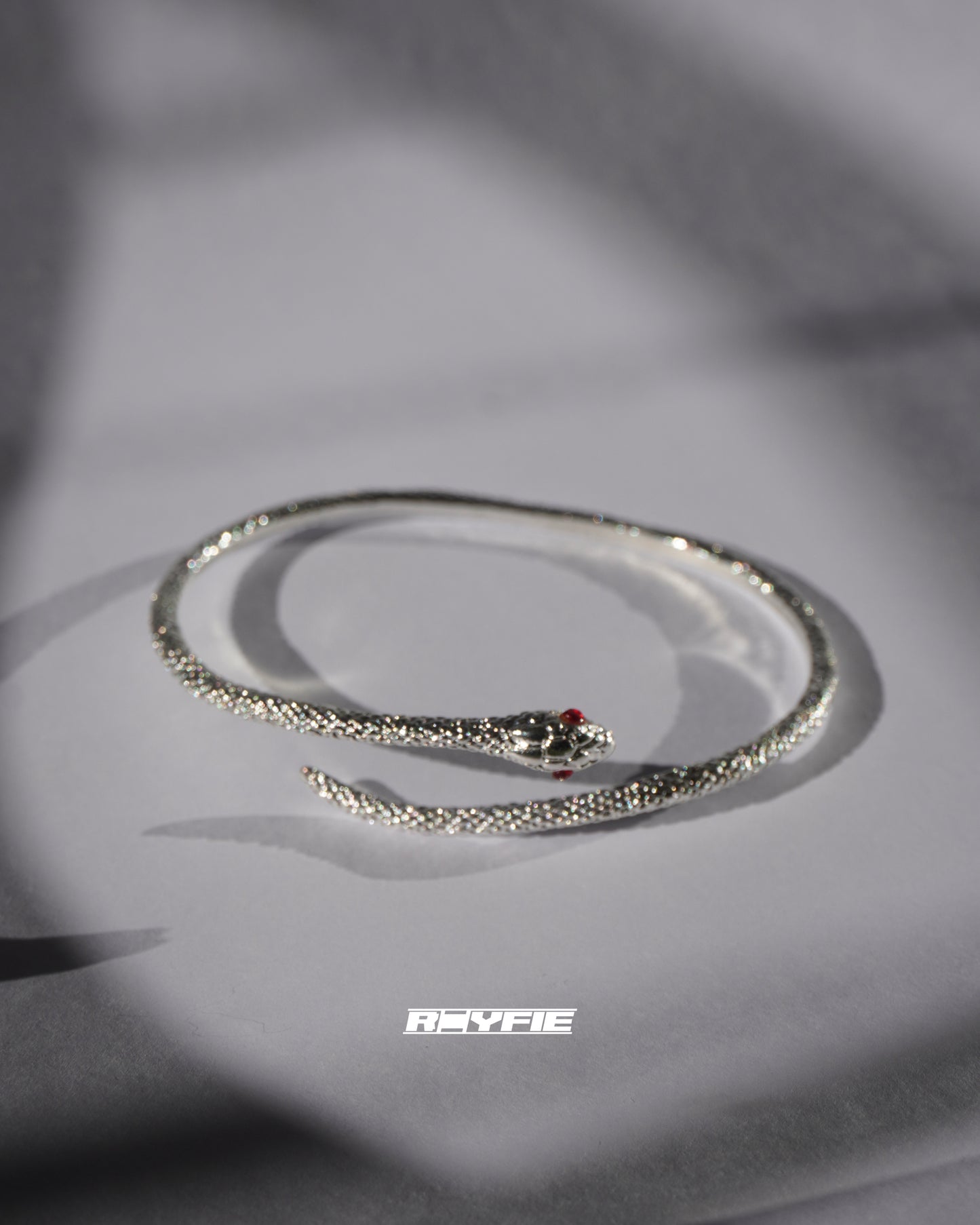 INTERSEKT Sleek Serpent Bangle