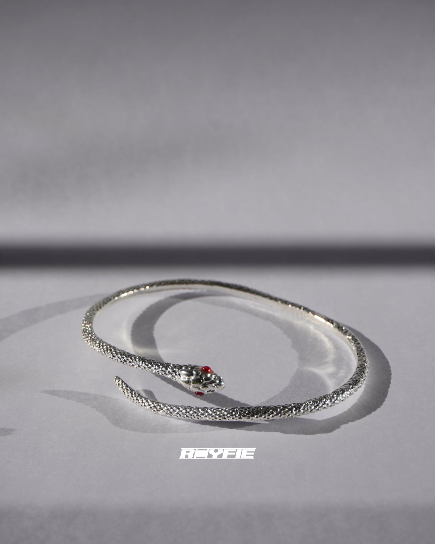 INTERSEKT Sleek Serpent Bangle