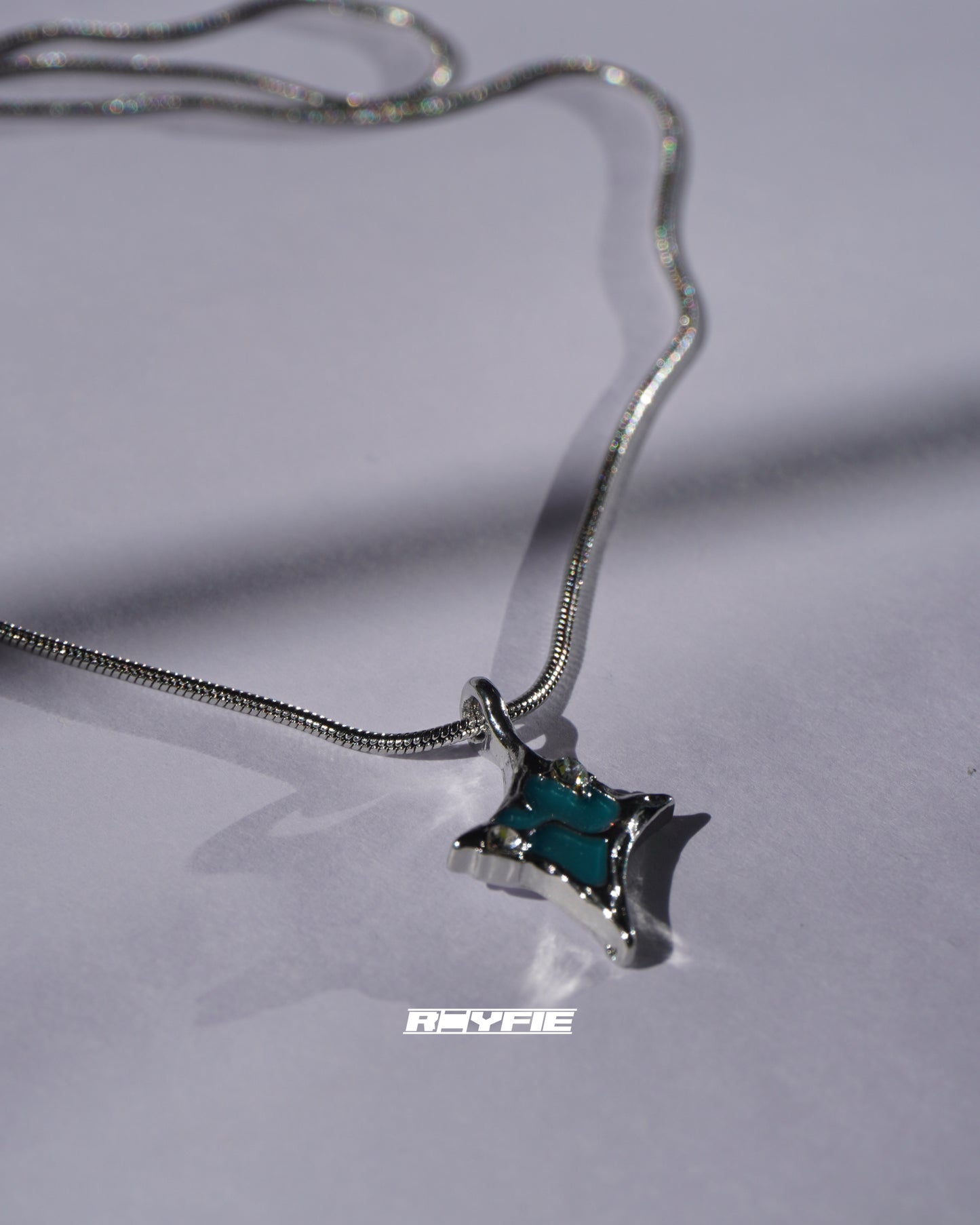 GESTALT Teal Starburst Necklace